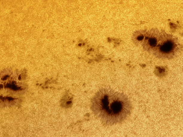 Sunspots and solar granulation 